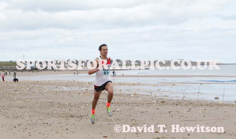 Conrad Franks (Gateshead) finishing the Pier to Pier Race, South Shields to Roker, Sunderland.